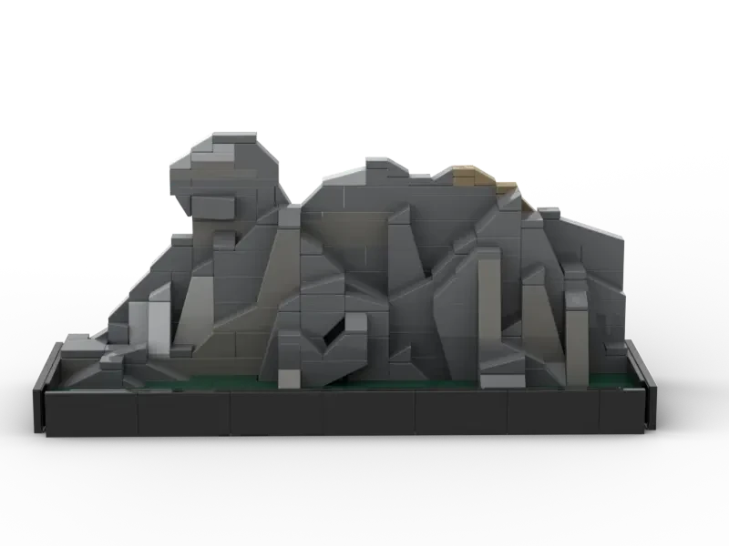 Brick-built model of Lion Rock shown in side view on a rectangular display base.
